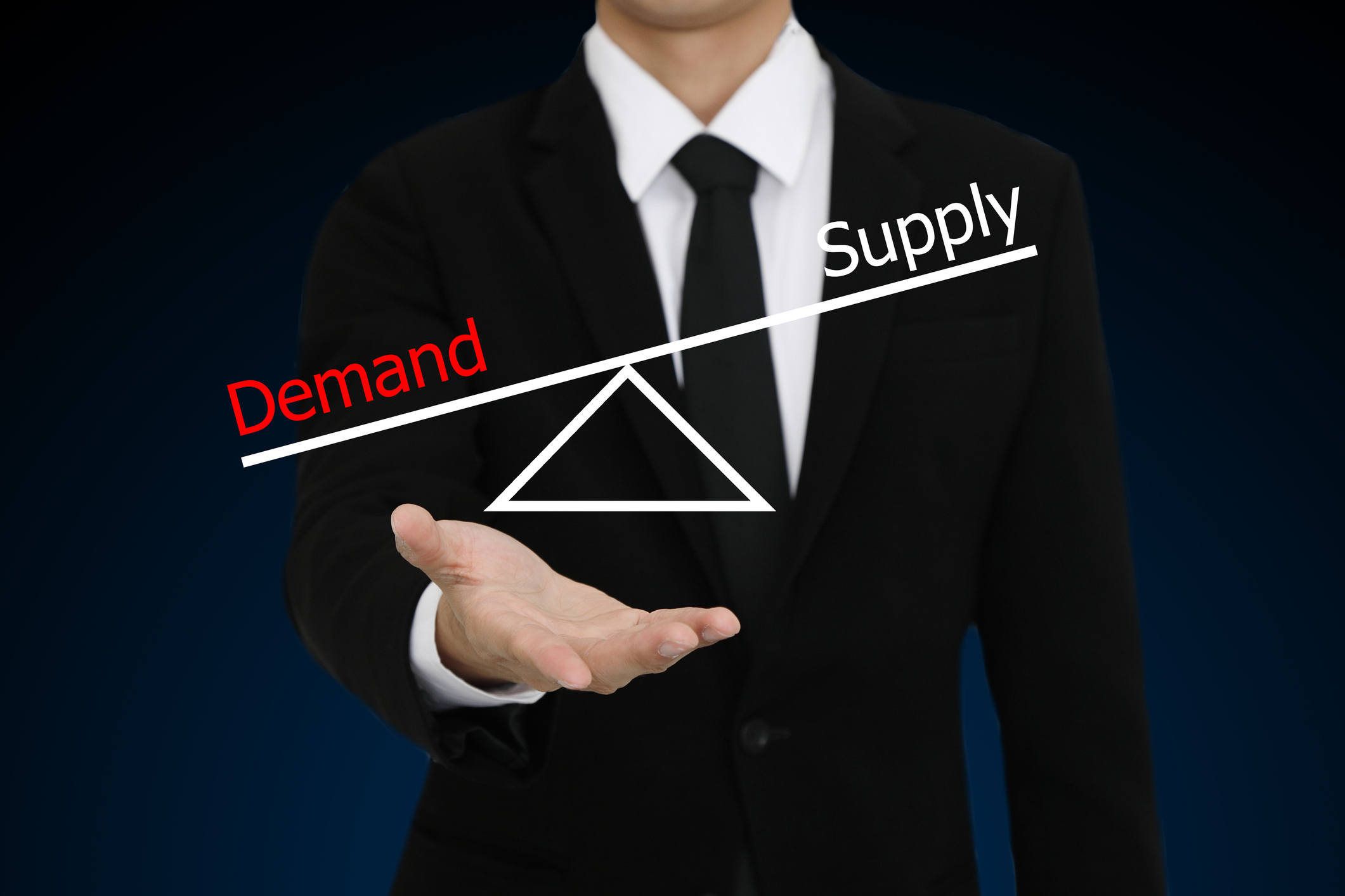 Businessman With Open Hand Gesture Presenting Demand Supply Diag