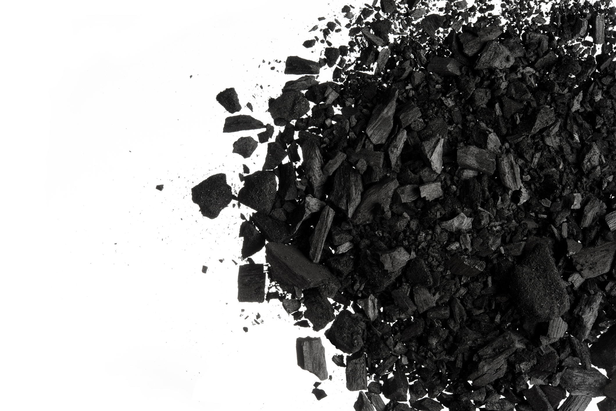 Pile Of Carbon Charcoal Dust On White Background