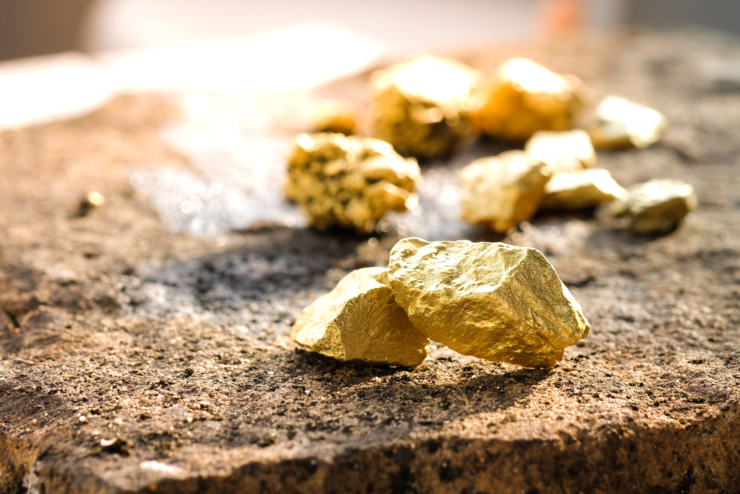 The Pure Gold Ore Found In The Mine On A Stone Floor