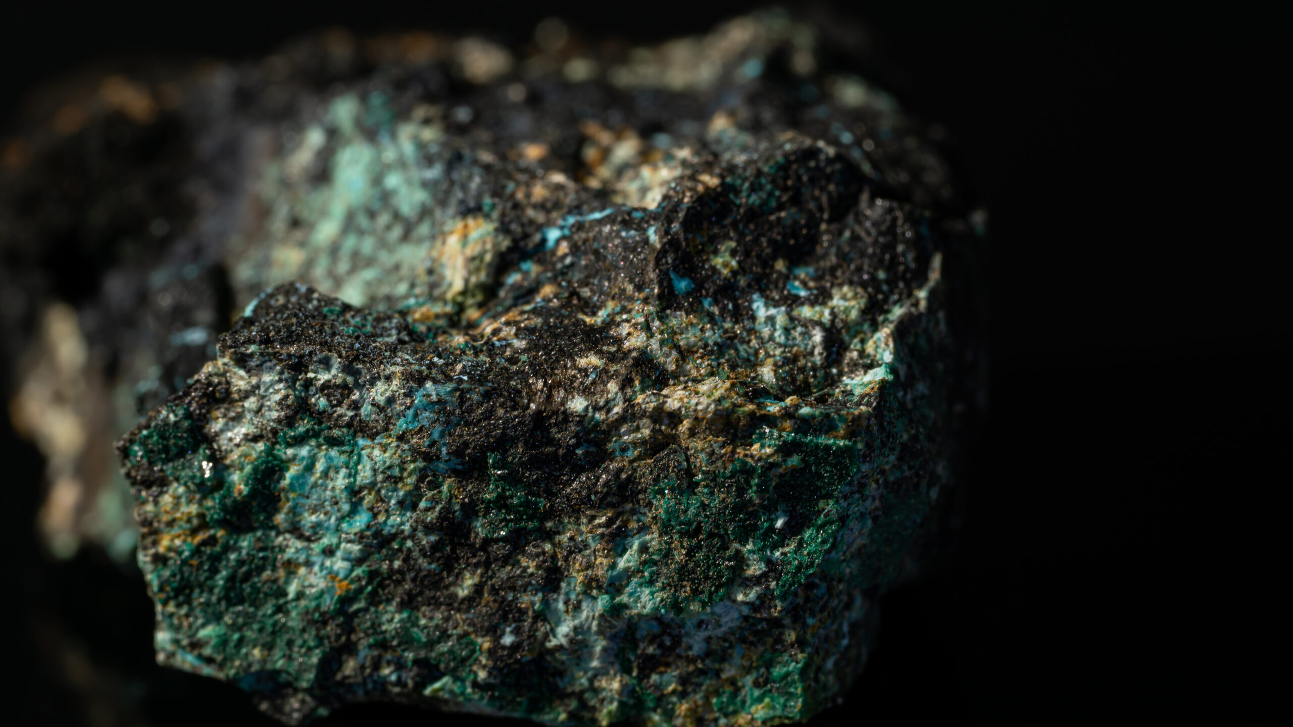 Closeup Of A Chalcocite, Copper Sulfide Isolated On A Black Background